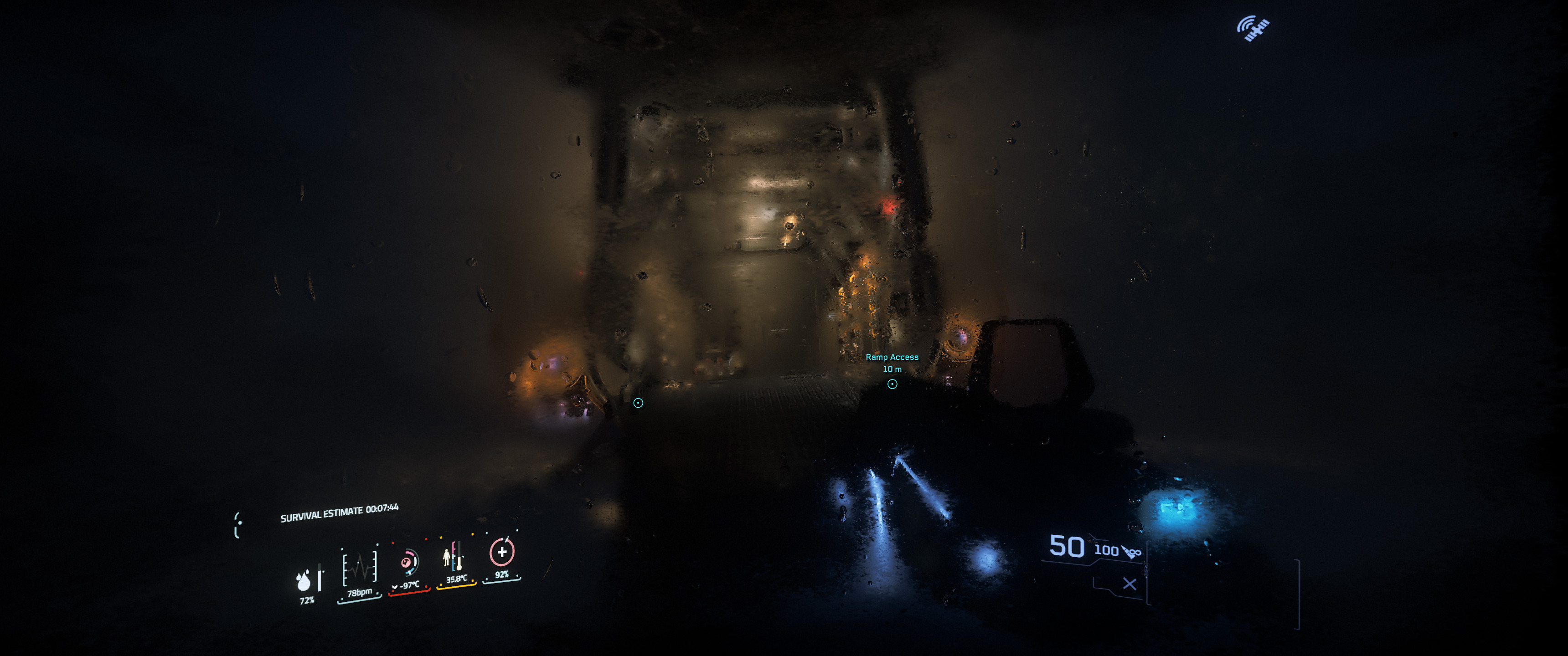 First-person view with heads up display, with surprisingly realistic rain blurring the view out the helmet glass